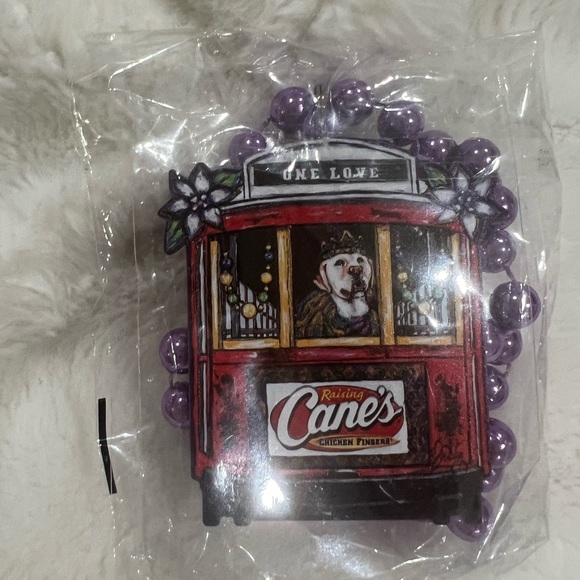 2024 RAISING CANE'S CHICKEN FINGERS TERRANCE OSBORNE MARDI GRAS POSTER necklace - Picture 4 of 4